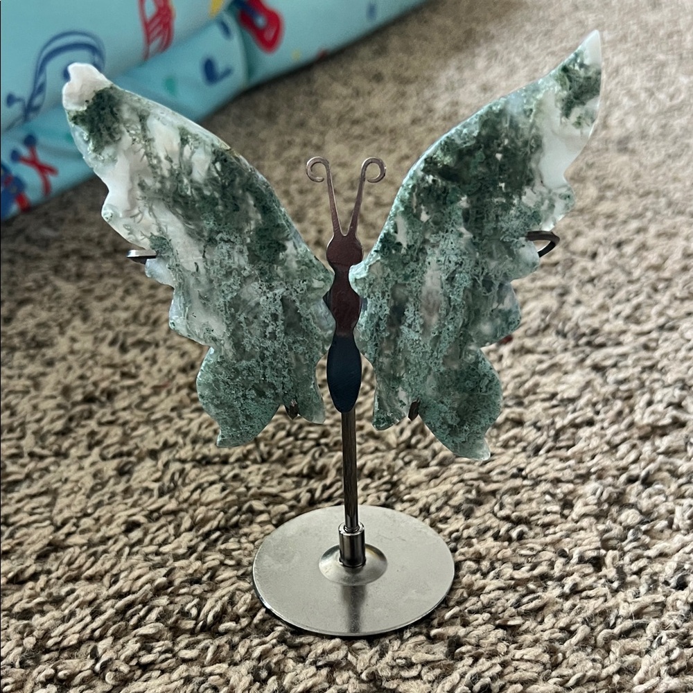 Green and White Stone Butterfly Figurine on Metal Stand